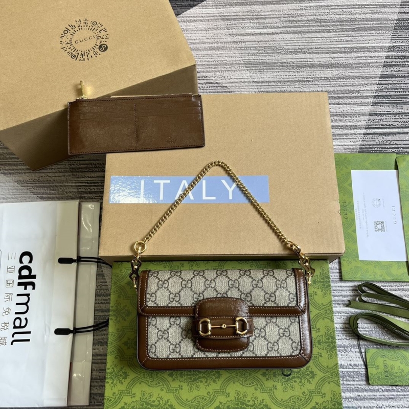 G*u*i top handle bags